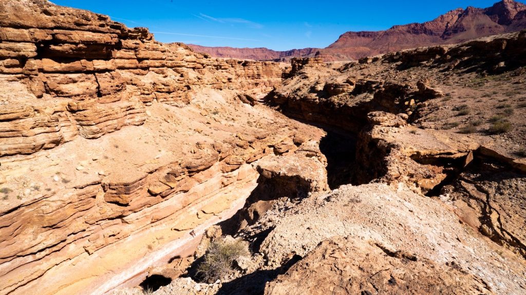 a view of a canyon in the middle of the desert