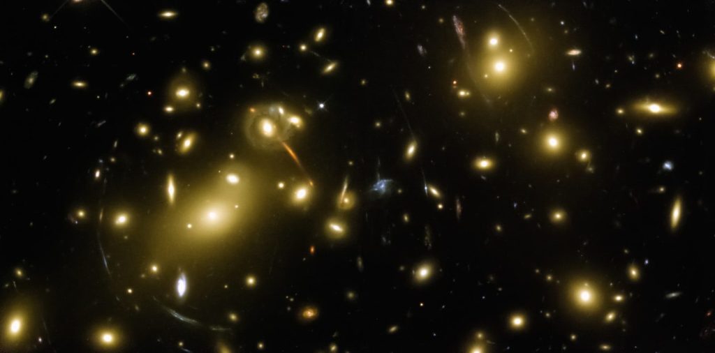 a cluster of yellow lights in the dark