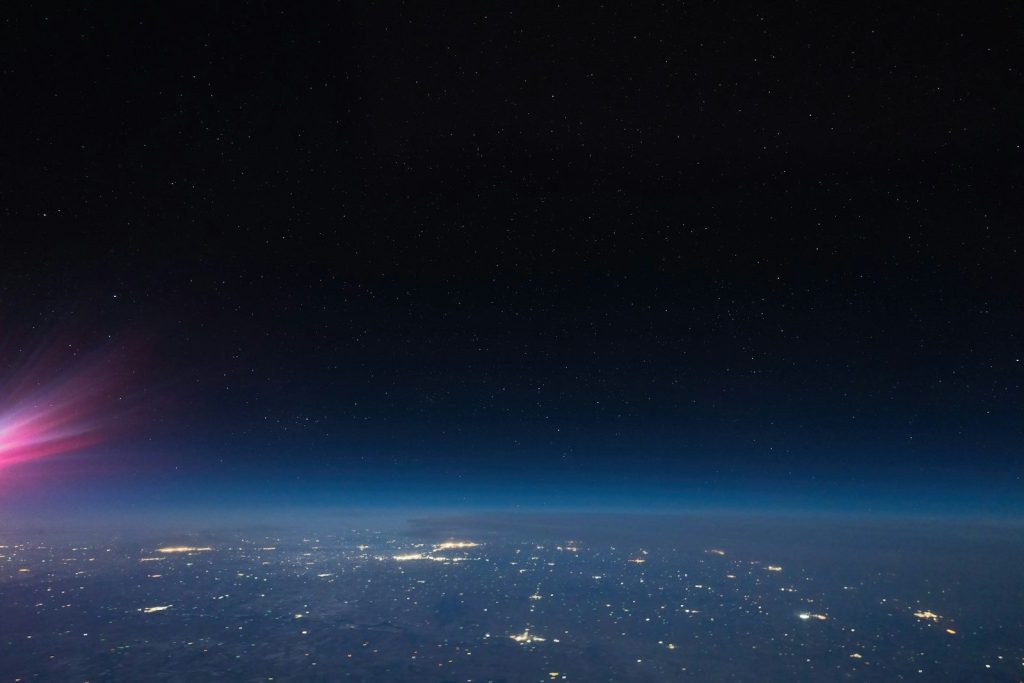 a view of the night sky from an airplane