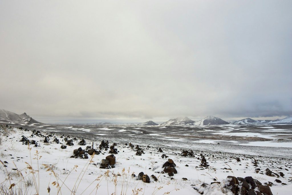 snow covered field during daytime