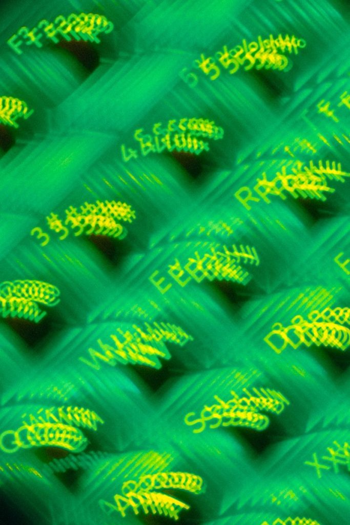 a close up of a green and yellow background