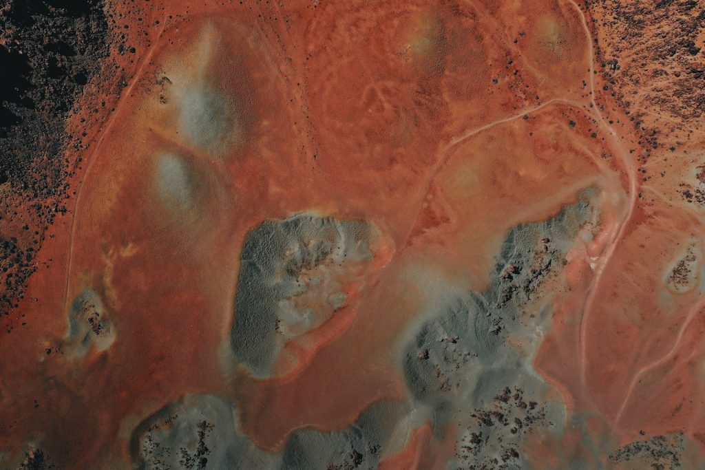 an aerial view of a barren area in the desert