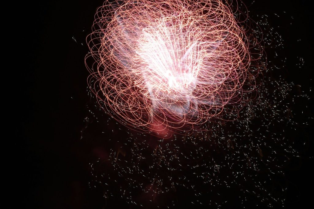 a firework exploding in the sky