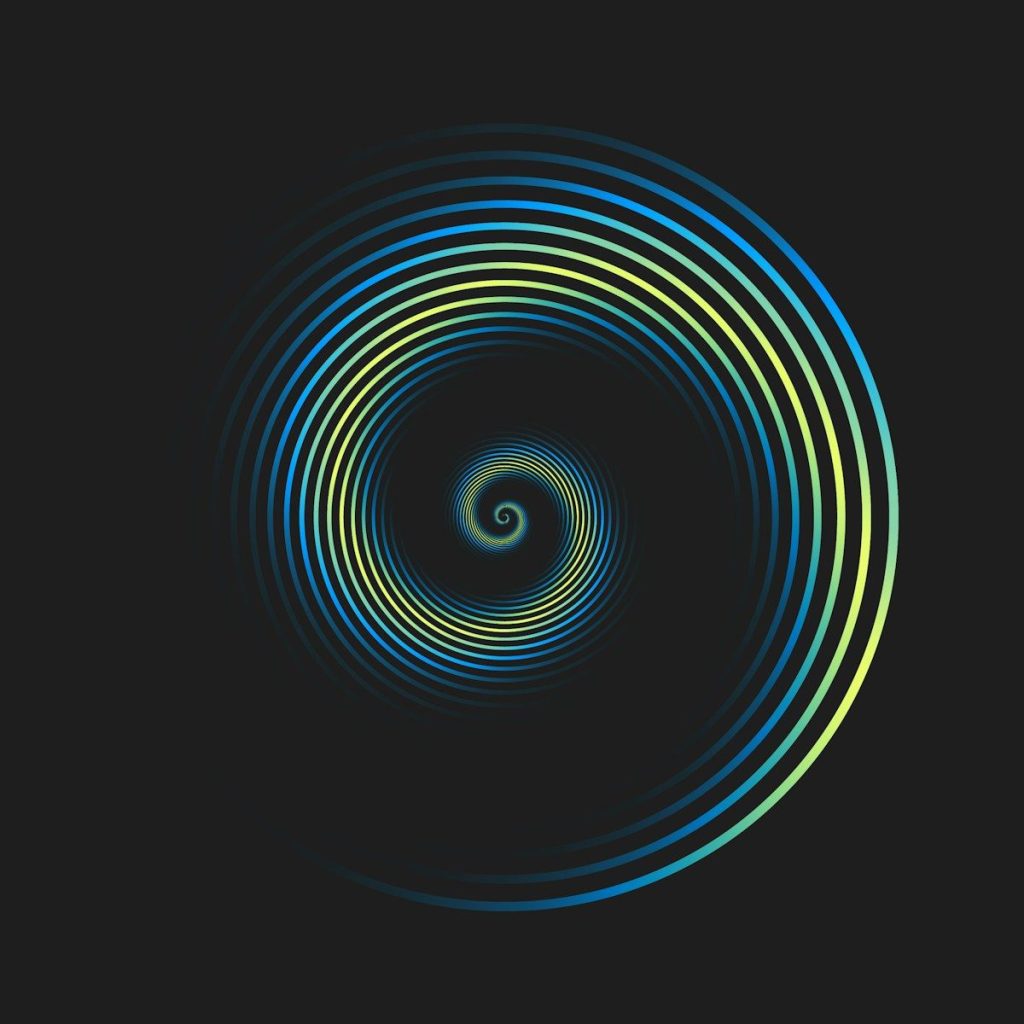 Blue and yellow spiral on a dark background