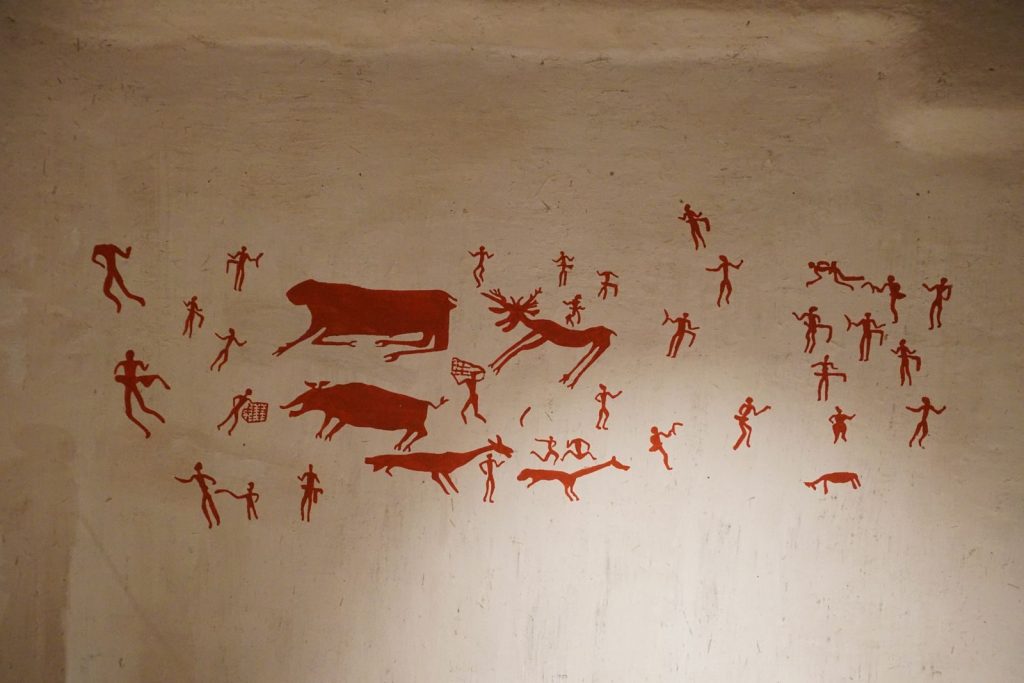 Çumra cave art showcasing ancient human and animal figures on a wall in Konya, Türkiye.