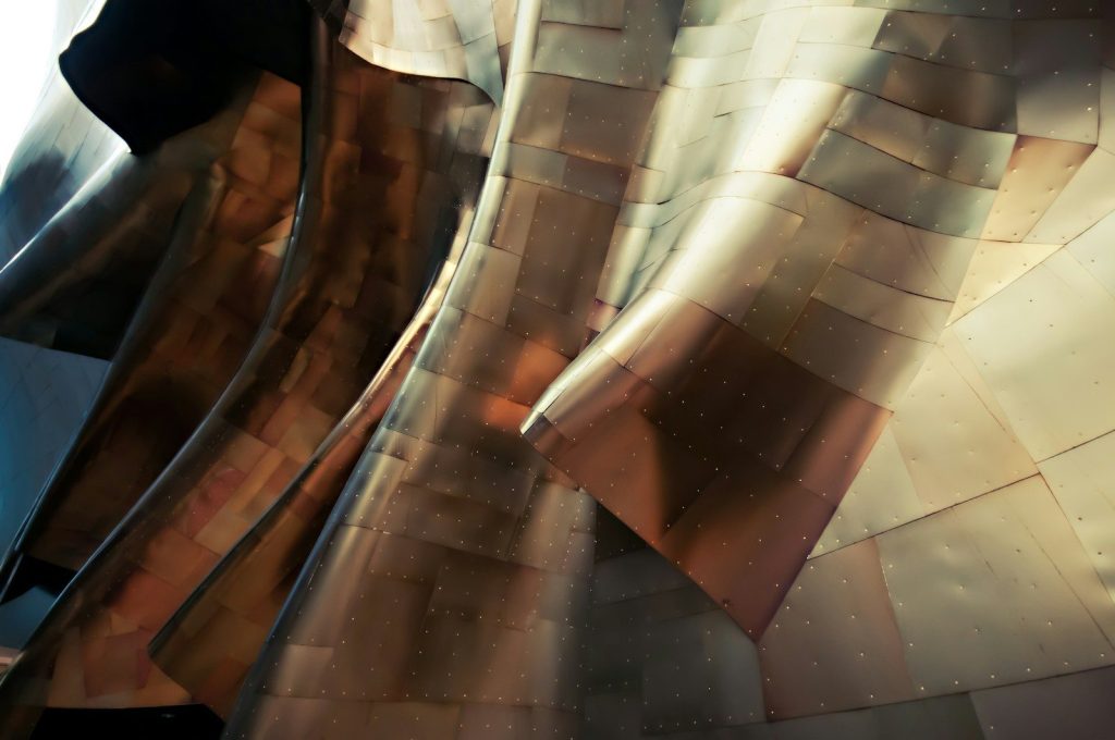 Glossy sheets of metal form abstract shapes in the Experience Music Project Museum