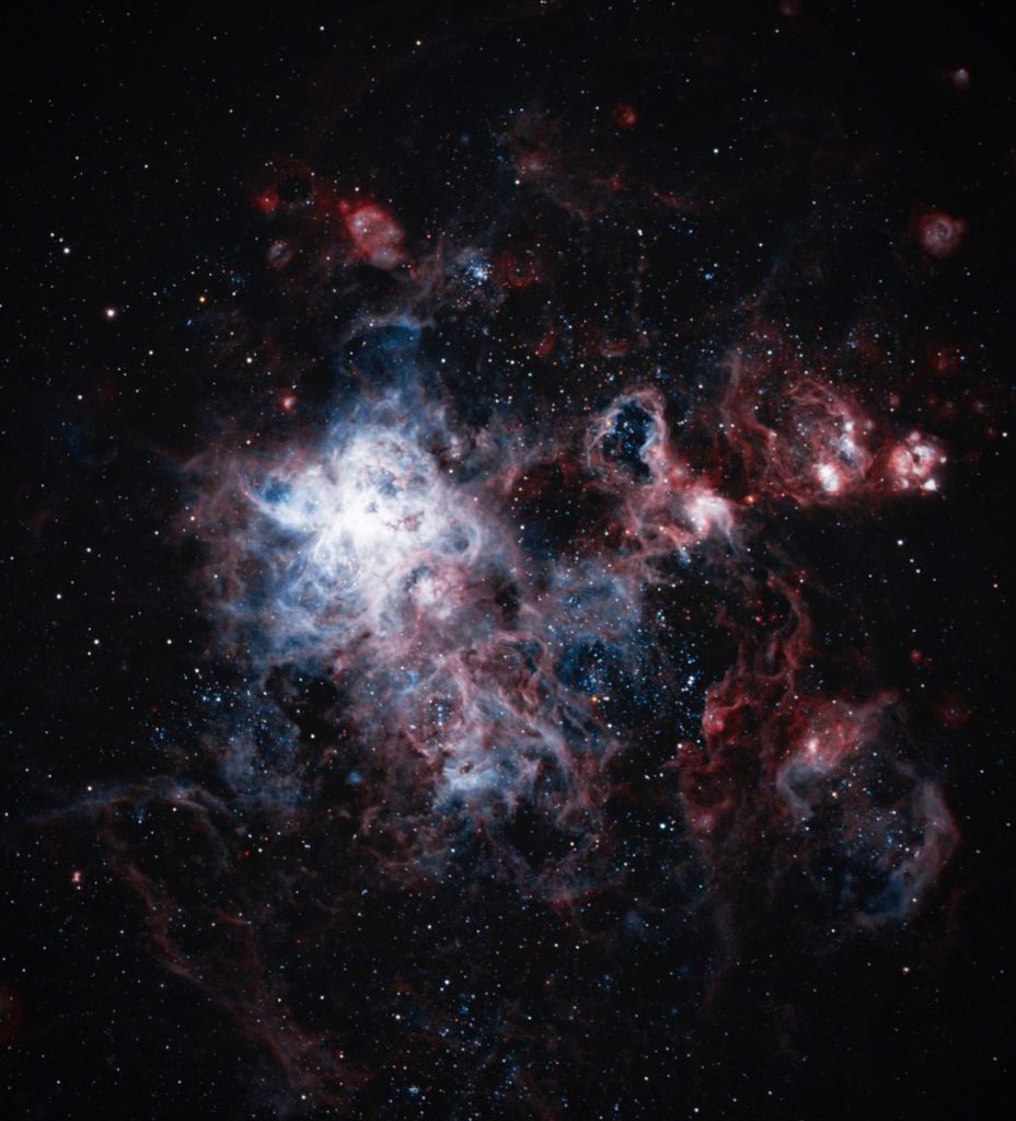 Captivating deep space view of the Tarantula Nebula with intricate star clusters.