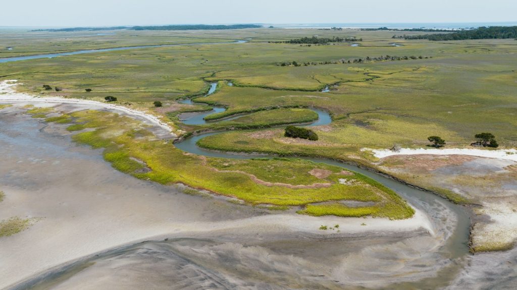 A serene aerial view of marshland and winding creeks on Hilton Head Island, South Carolina.