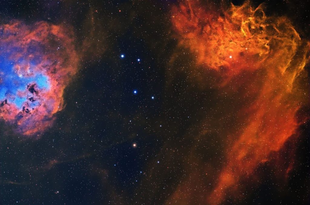 Stunning capture of a vibrant nebula against a starry space backdrop.