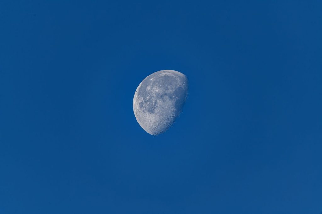 Capture of the moon during daytime against a clear blue sky in Canonsburg, Pennsylvania.