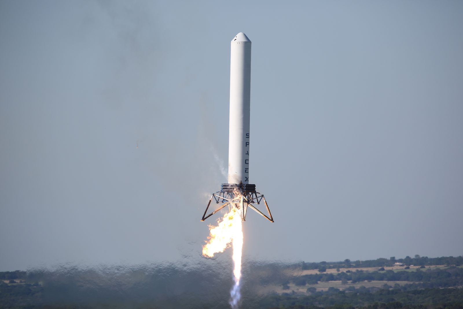 A powerful rocket launches into the sky, showcasing advanced space technology.