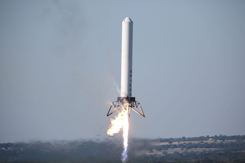 A powerful rocket launches into the sky, showcasing advanced space technology.