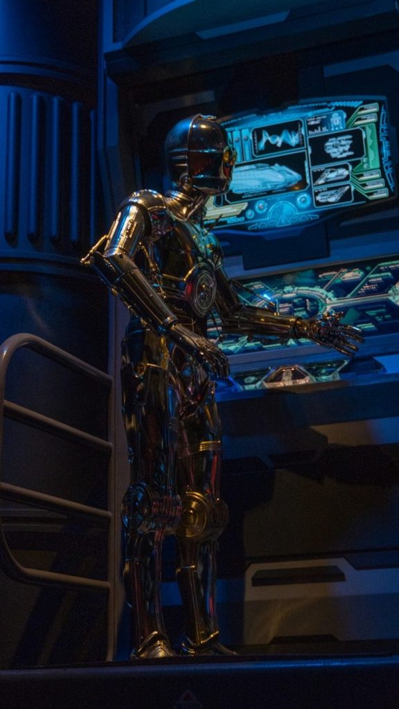 a man in a star wars costume standing on a stage