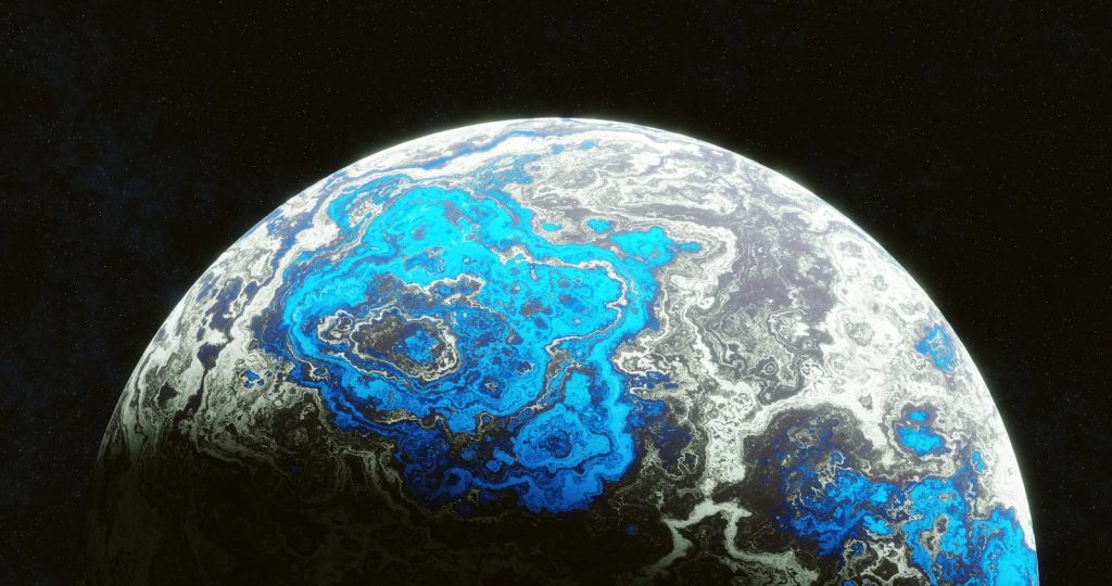 A close up of a blue and white object on a black background