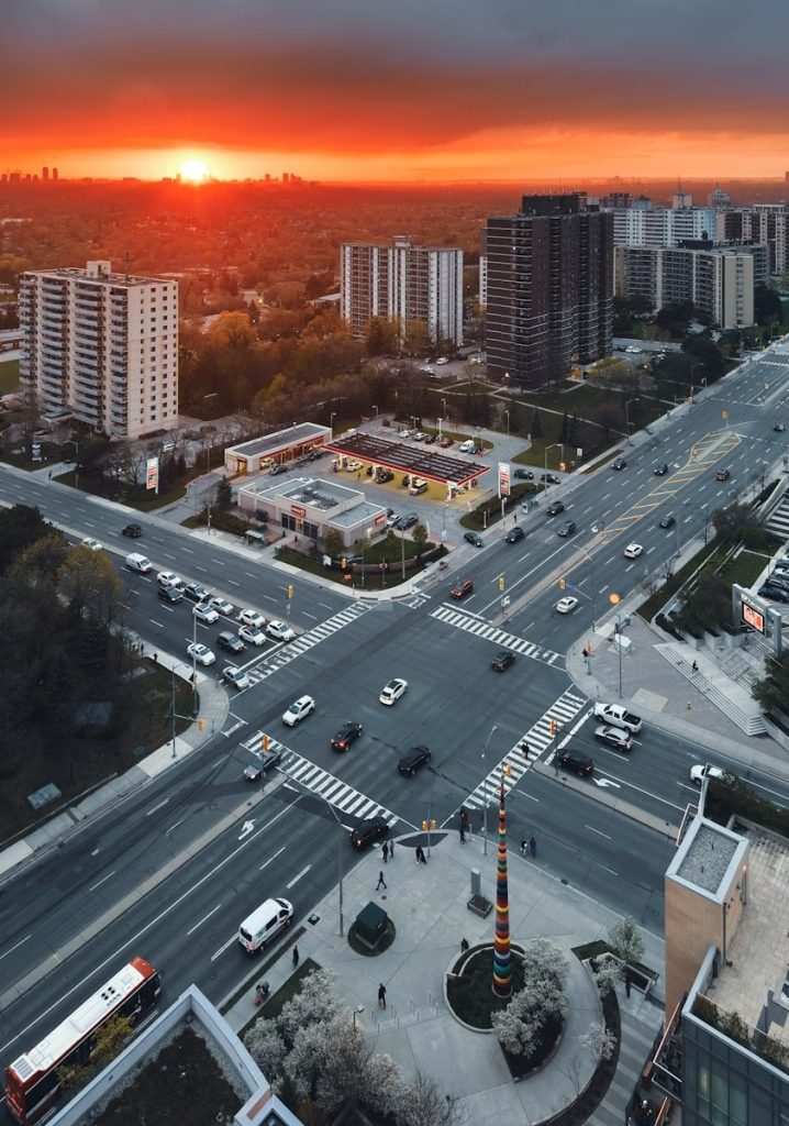 An aerial view of a city at sunset