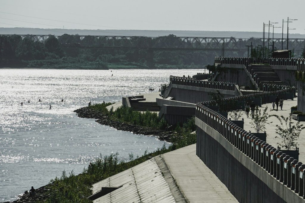 a view of a body of water with a bridge in the background