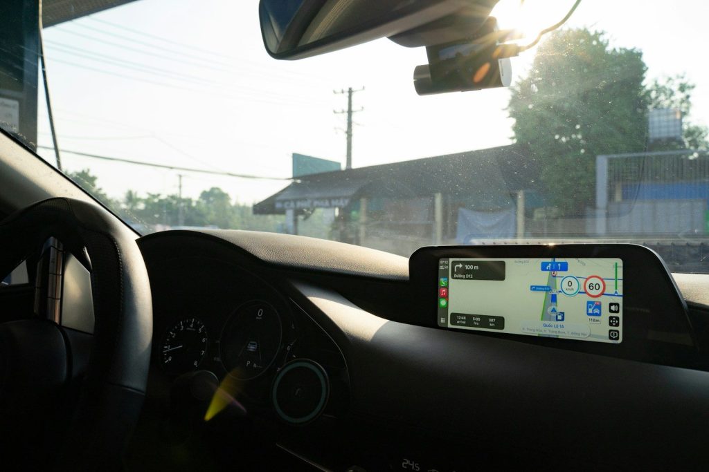 Inside a car looking at the gps.
