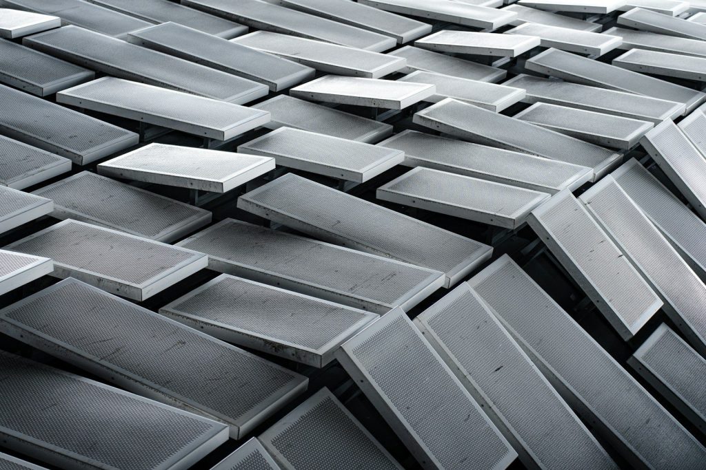 a bunch of metal boxes stacked on top of each other