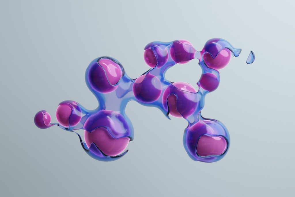 a purple and blue substance floating in the air