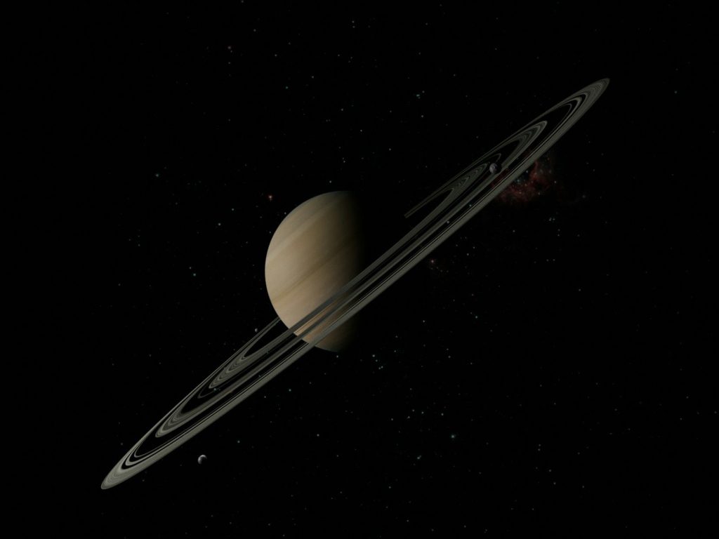 Saturn and its rings in deep space.