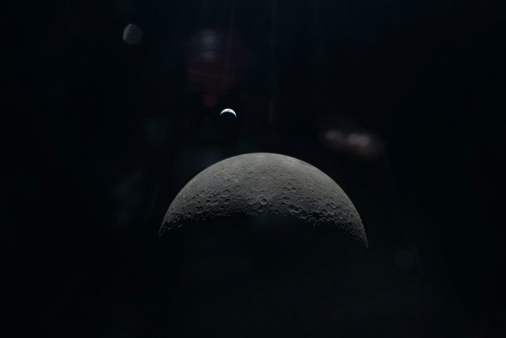 Crescent moon in the dark night sky.
