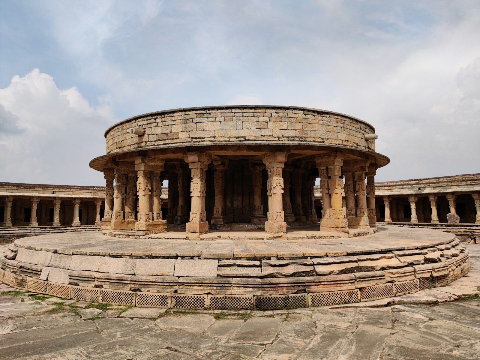 a circular building with pillars and pillars around it