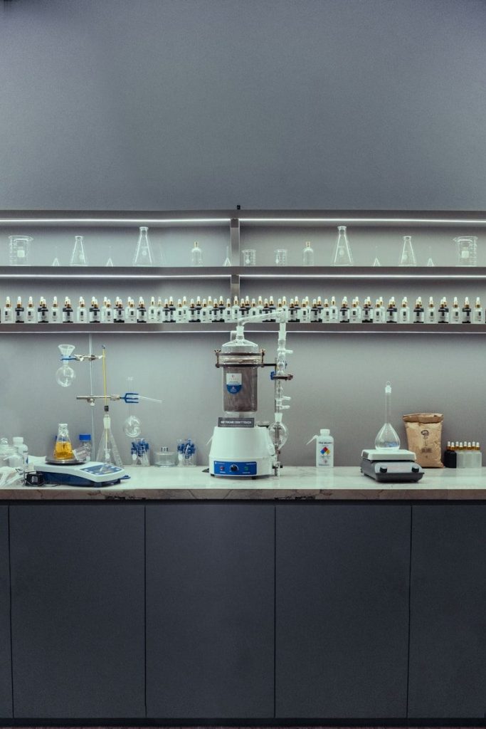 A clean laboratory bench with scientific equipment and glassware.