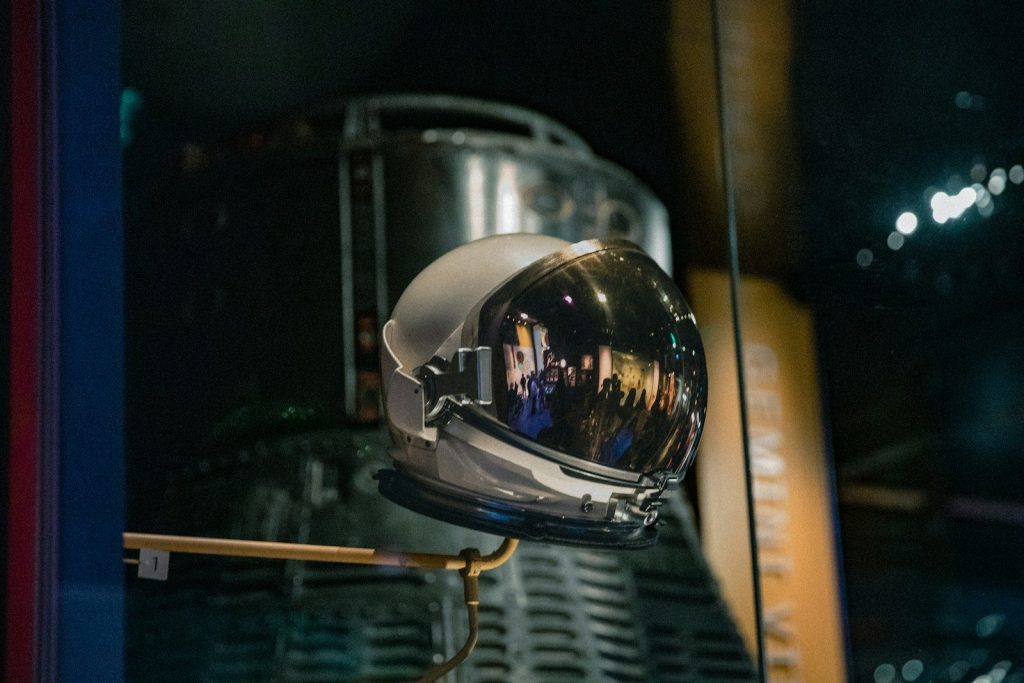 a close up of a helmet on a stand