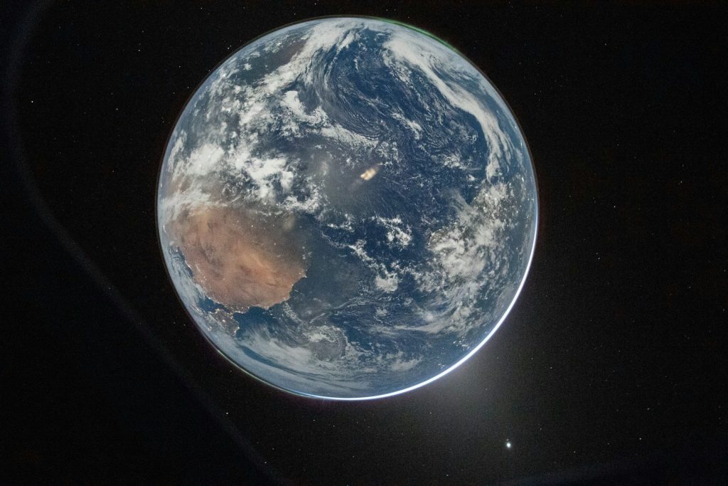 View of planet earth from space with clouds.