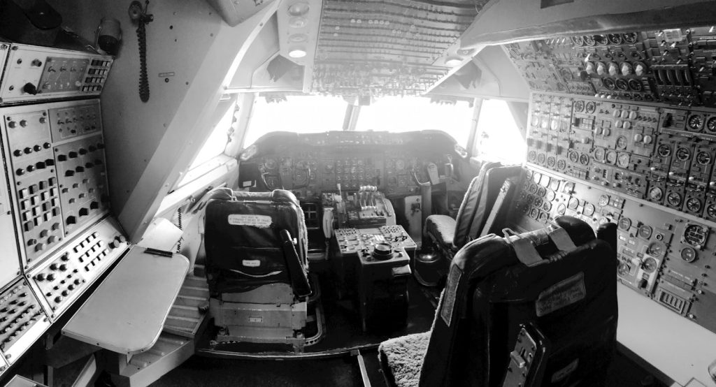 grayscale photo of luggage bags