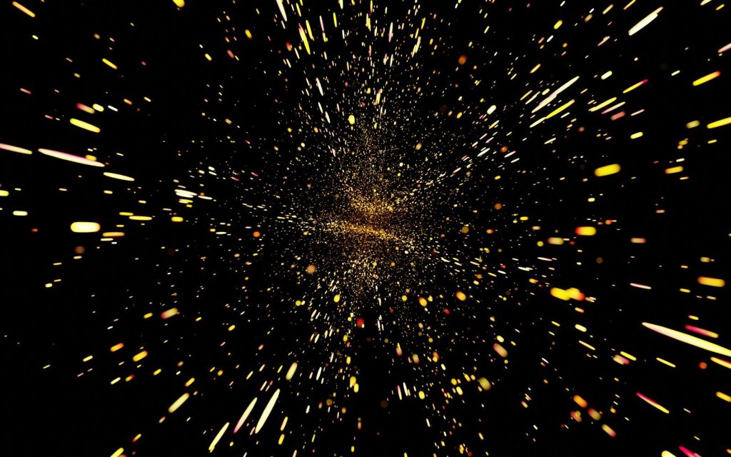 a black background with yellow and red speckles