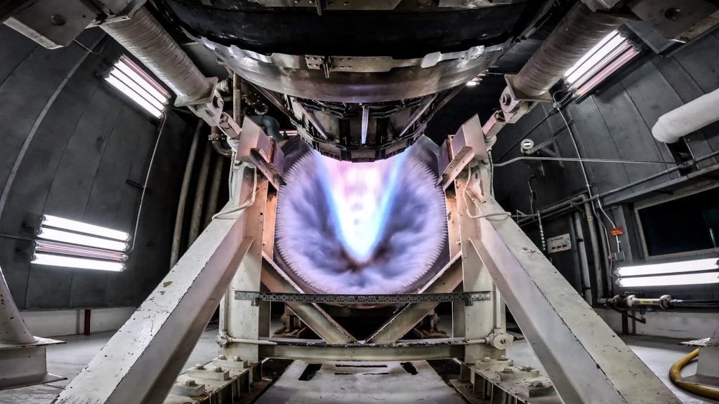 the inside of a space station with a large screen