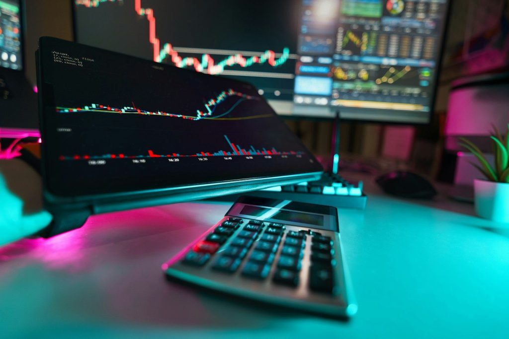 A desk with a keyboard and a monitor