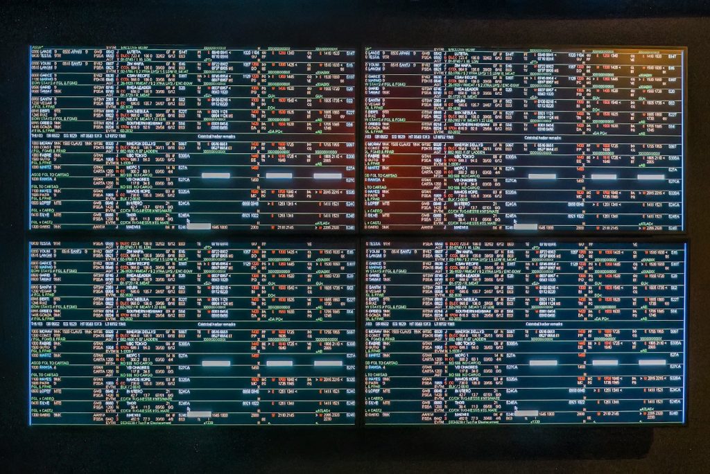 A large screen with a lot of numbers on it