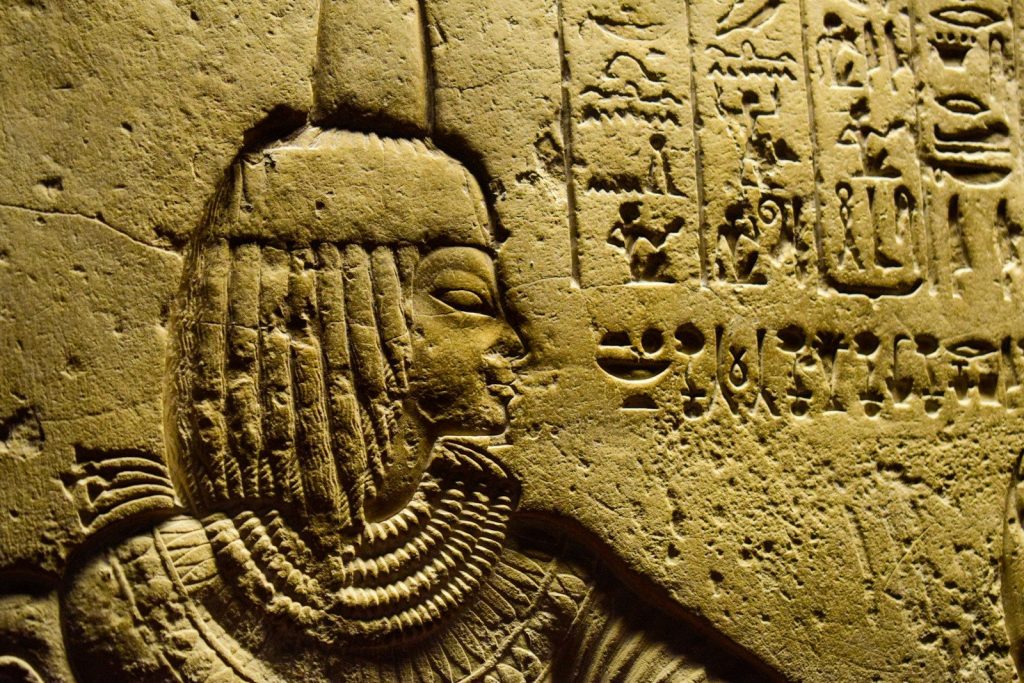 a close up of a carving on a wall