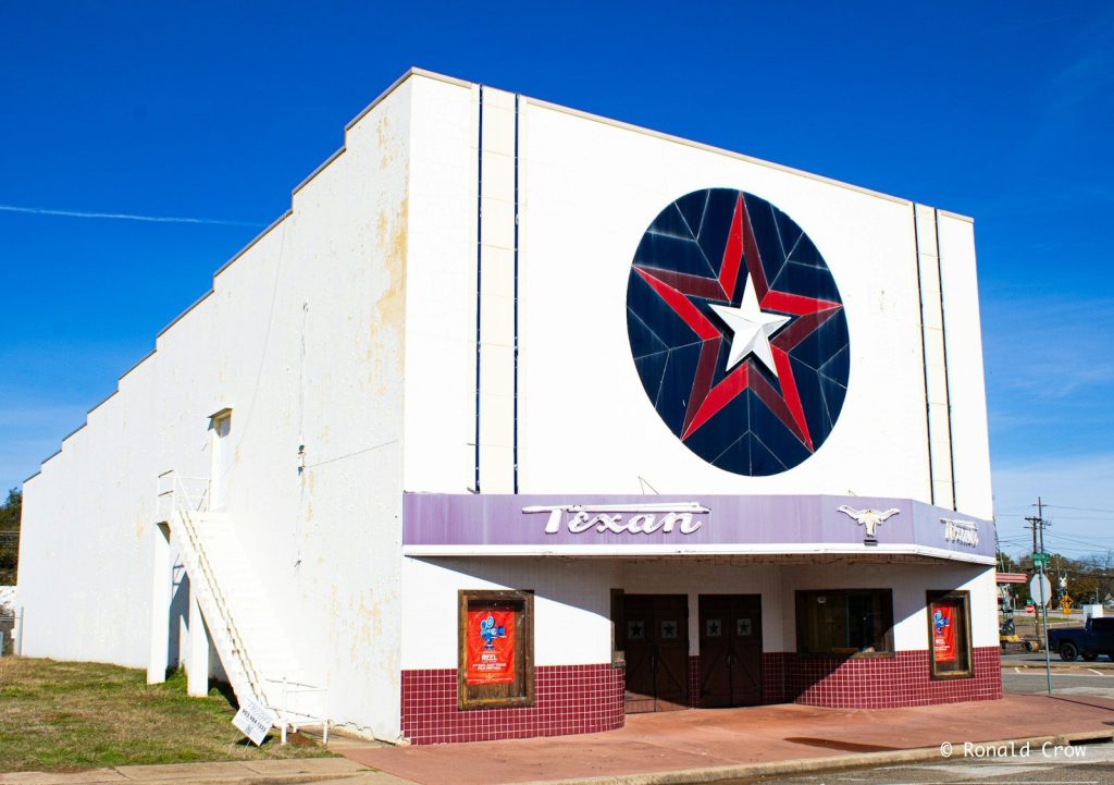 A large white building with a red star on it
