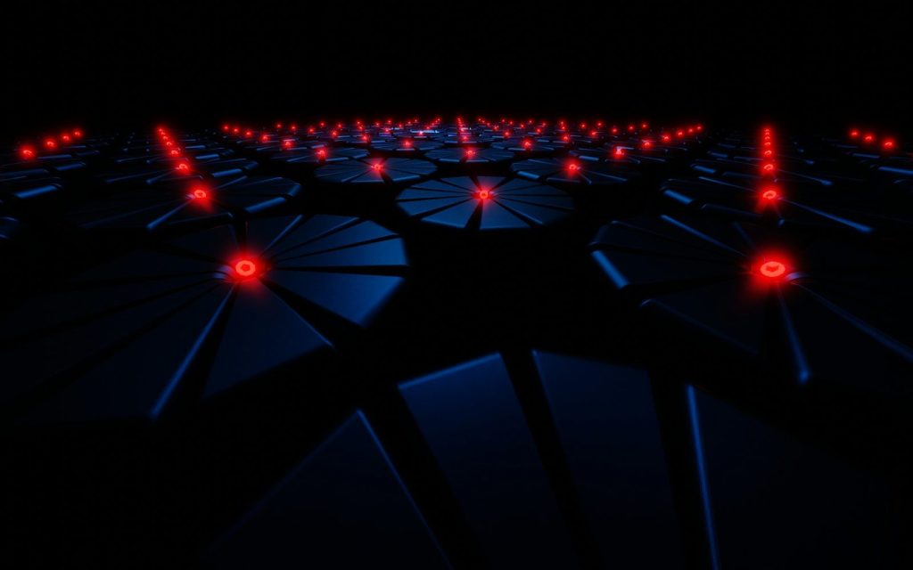 a dark room filled with red and blue lights