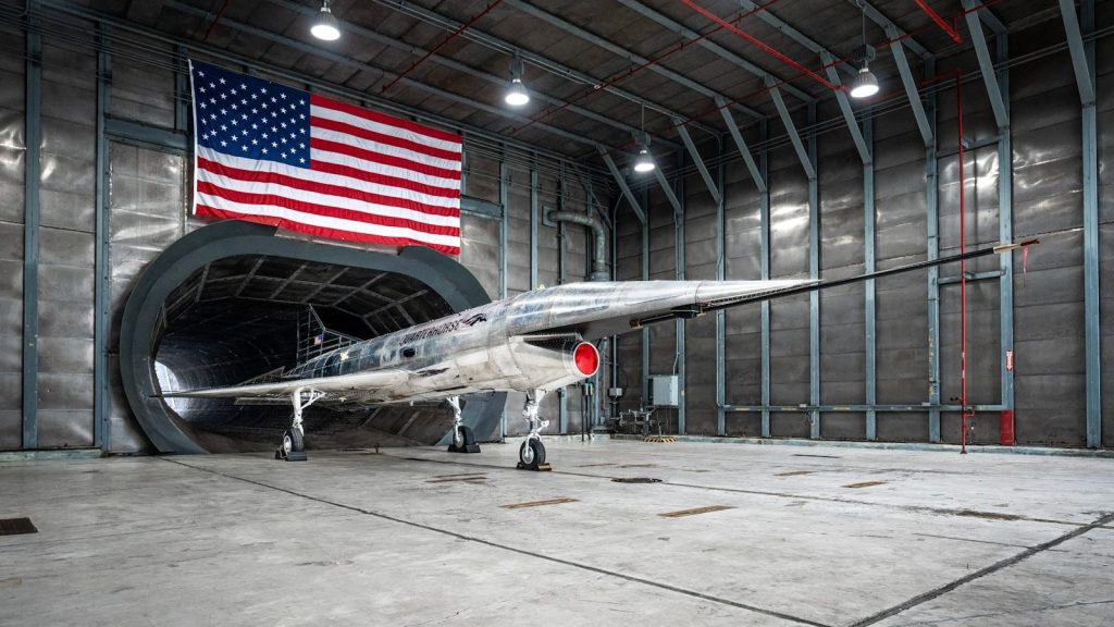A small airplane parked inside of a hangar