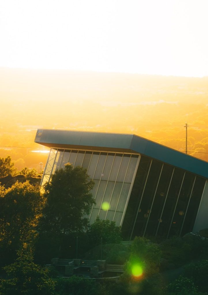 Modern building illuminated by the golden sunset.