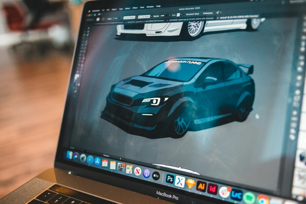 black and blue car on black dell laptop computer