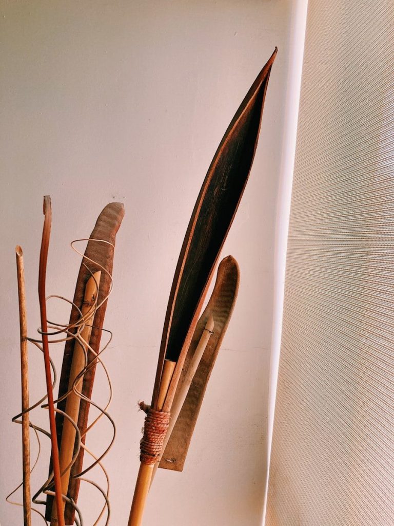 brown and white sticks on white surface