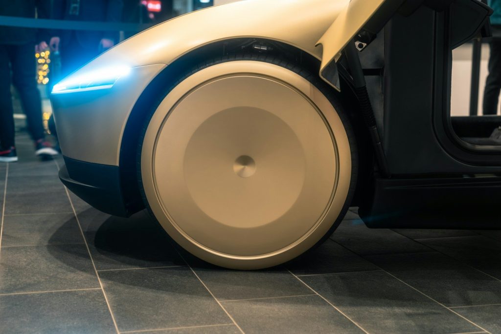 A close up of a robot on a tiled floor