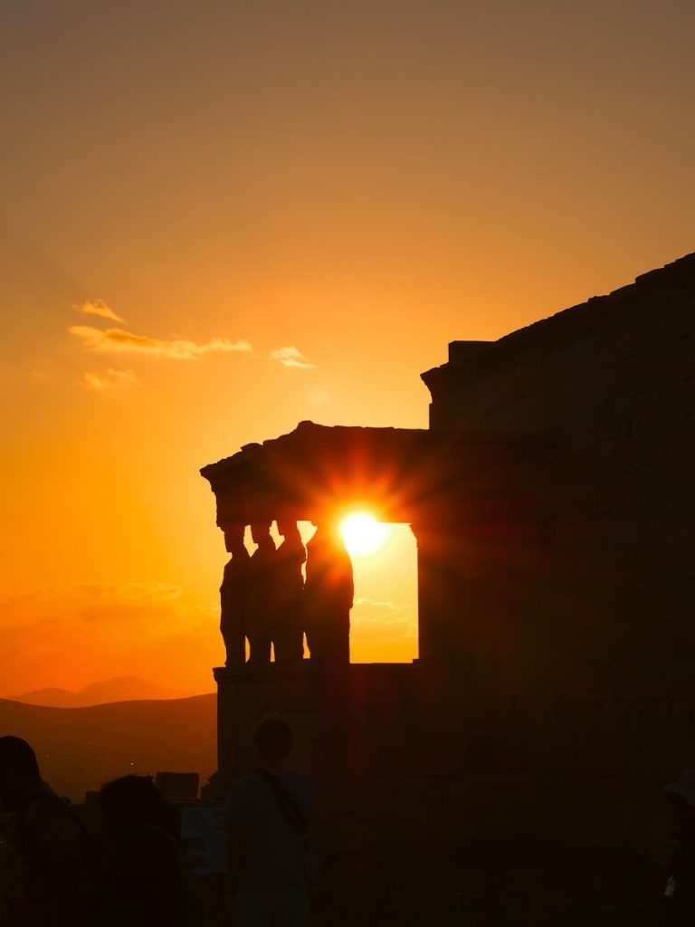 Sunset silhouette of ancient greek caryatids