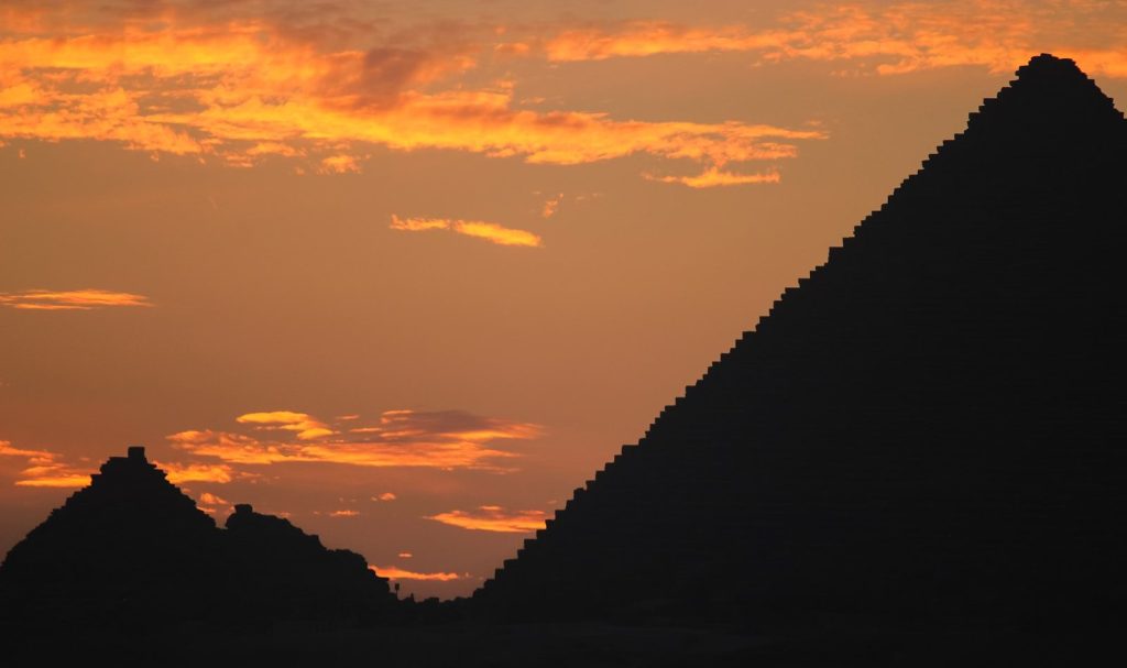 silhouette of mountain during sunset