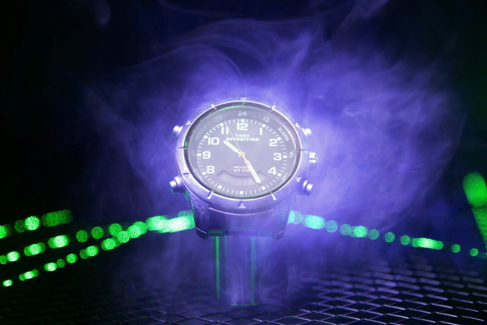 a close up of a clock on a table