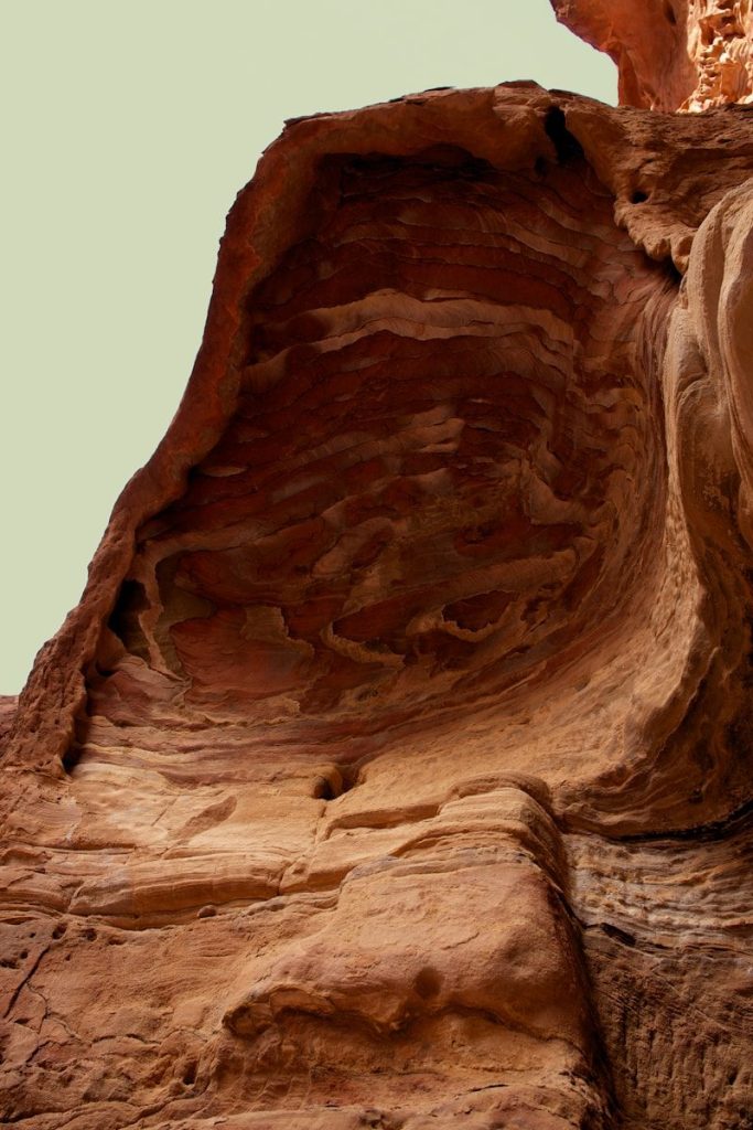 Eroded sandstone rock formation with swirling patterns