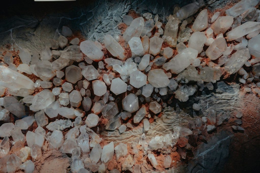 Crystals are clustered together on a surface.