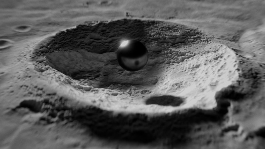 A metallic sphere rests in a lunar crater.