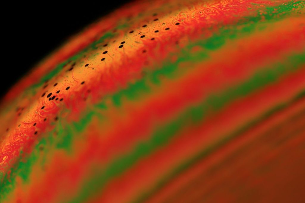 a close up of a red and yellow fabric