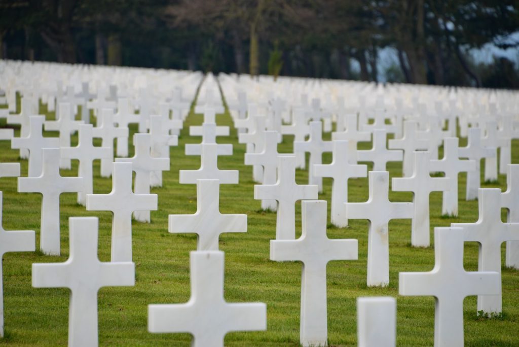 Rows of white crosses at the Normandy American Cemetery symbolize fallen soldiers of WWII.